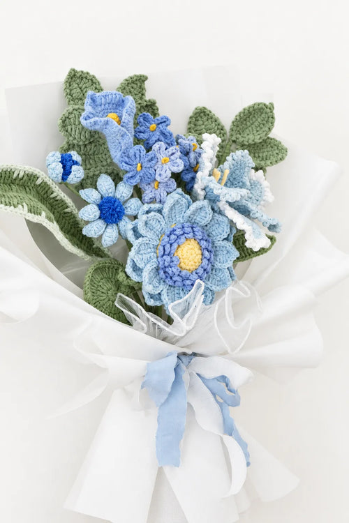 Blue Lily with Calla Lily and Forget-Me-Not Bouquet by Foxchill, handmade crochet flowers, front view of the wrapped bouquet