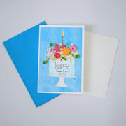 Happy Birthday Cake quilled greeting card with colorful paper flowers and a candle shown with envelope and message insert