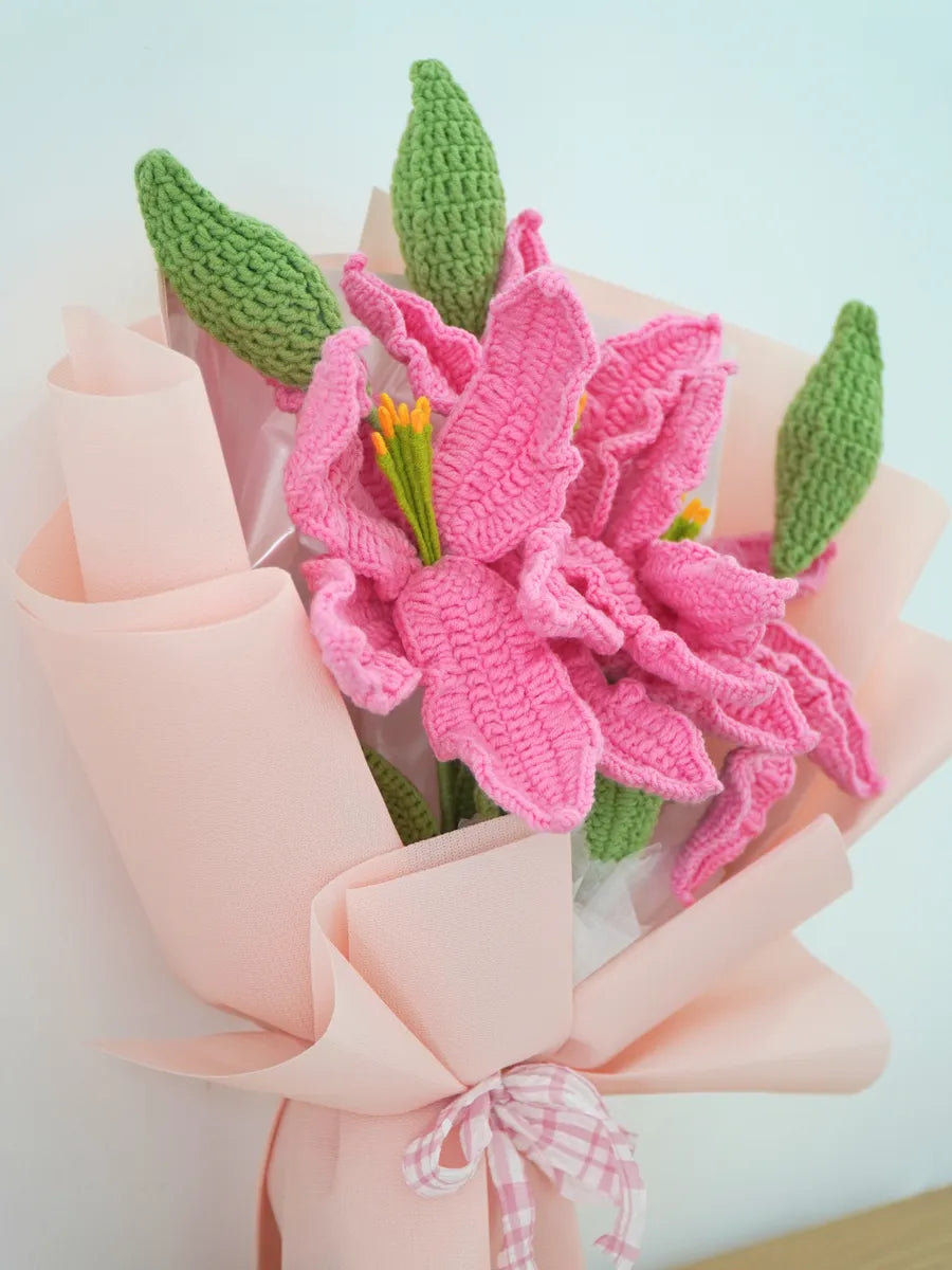 Pink Lily Cluster Bouquet by Foxchill, handmade crochet flowers, front view of the wrapped bouquet