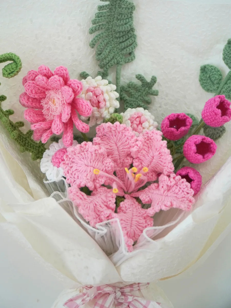 Pink Lily with Chrysanthemum, Daisy and Bellflower Bouquet by Foxchill, handmade crochet flowers, angled close-up of the yarn flowers