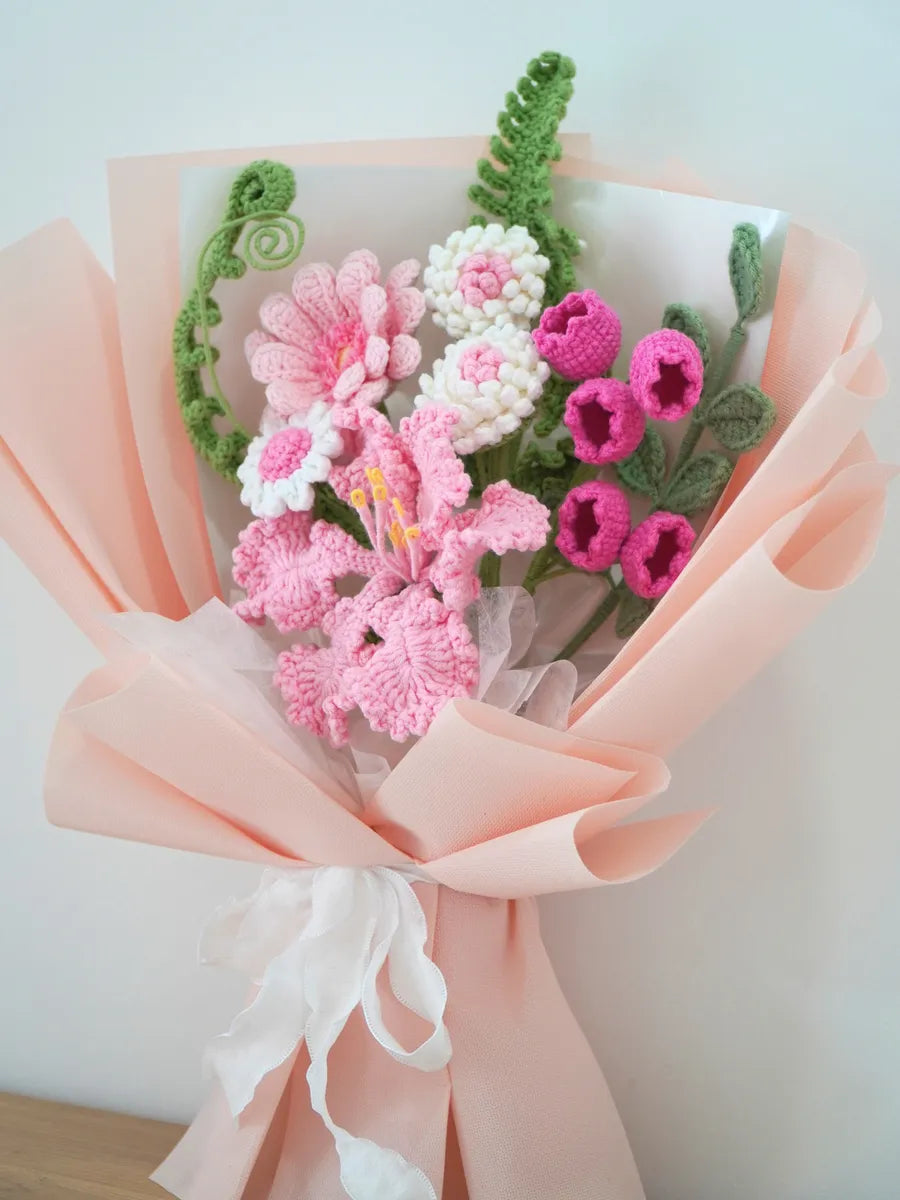 Pink Lily with Daisy and Bellflower Bouquet by Foxchill, handmade crochet flowers, angled close-up of the yarn flowers